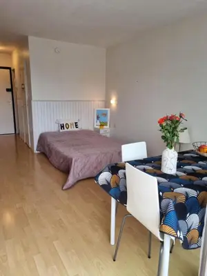 Un ou plusieurs lits dans un hébergement de l'établissement COSY STUDIO BENODET vue mer accès direct plage Thalasso Casino