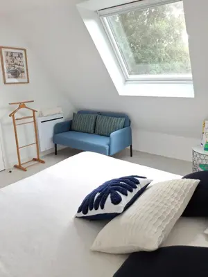 Un ou plusieurs lits dans un hébergement de l'établissement Chambre d'hôtes avec petit-déjeuner
