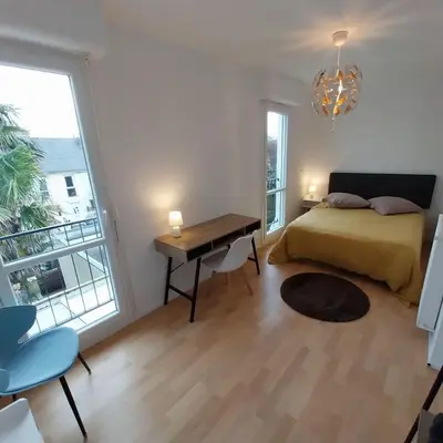 Un ou plusieurs lits dans un hébergement de l'établissement Maison de ville proche de tout, 5min du centre ville & 20min de la plage