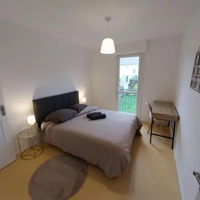 Un ou plusieurs lits dans un hébergement de l'établissement Maison de ville proche de tout, 5min du centre ville & 20min de la plage
