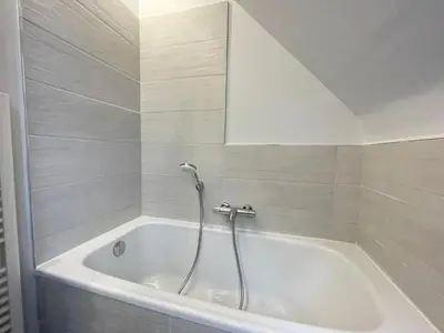 Salle de bains dans l'établissement Maison de famille Henvic