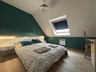 Un ou plusieurs lits dans un hébergement de l'établissement Maison bord de mer