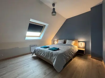 Un ou plusieurs lits dans un hébergement de l'établissement Maison bord de mer