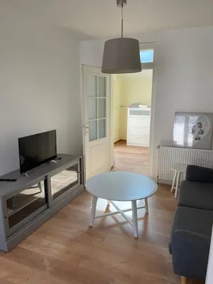 Télévision ou salle de divertissement dans l'établissement Ty Glaz