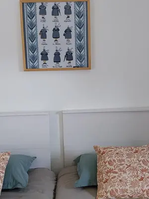 Coin salon dans l'établissement Séjour cosy proche mer- la Torche- spot surf