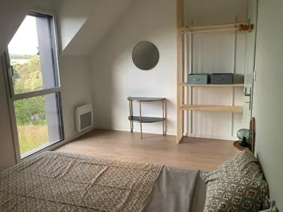 Un ou plusieurs lits dans un hébergement de l'établissement Eco-friendly house