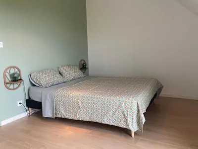 Un ou plusieurs lits dans un hébergement de l'établissement Eco-friendly house
