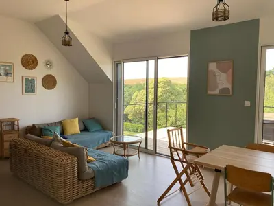 Coin salon dans l'établissement Eco-friendly house