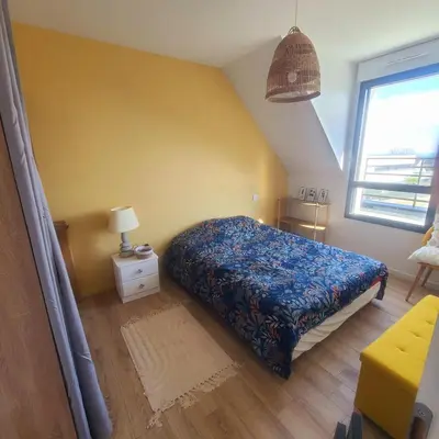 Un ou plusieurs lits dans un hébergement de l'établissement Comme à la maison ! 4 chambres, vue mer