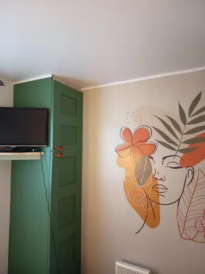Télévision ou salle de divertissement dans l'établissement Mobile home