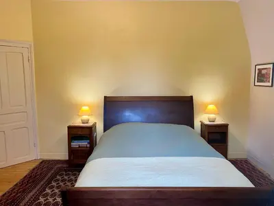 Un ou plusieurs lits dans un hébergement de l'établissement B&B Manoir de Keryvon