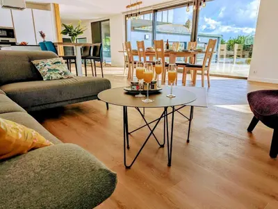 Coin salon dans l'établissement Villa Ty Koad 4 étoiles Piscine Intérieure 28C Plage et GR34 à 50m