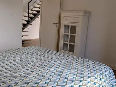 Un ou plusieurs lits dans un hébergement de l'établissement Villa Ty Koad 4 étoiles Piscine Intérieure 28C Plage et GR34 à 50m