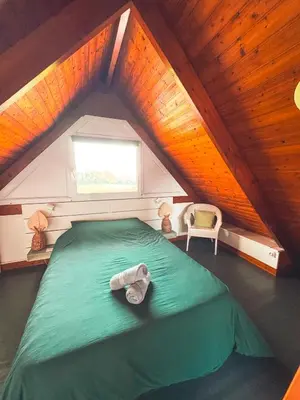 Un ou plusieurs lits dans un hébergement de l'établissement Chalet baie de La Forêt-Fouesnant