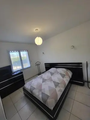 Un ou plusieurs lits dans un hébergement de l'établissement Chez Nath et Richard, chambre chez l'habitant