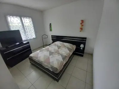 Un ou plusieurs lits dans un hébergement de l'établissement Chez Nath et Richard, chambre chez l'habitant