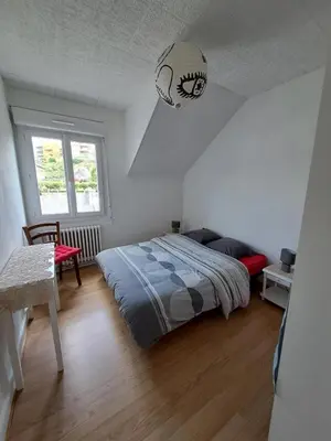 Un ou plusieurs lits dans un hébergement de l'établissement Charmante maison dans le centre historique de Morlaix