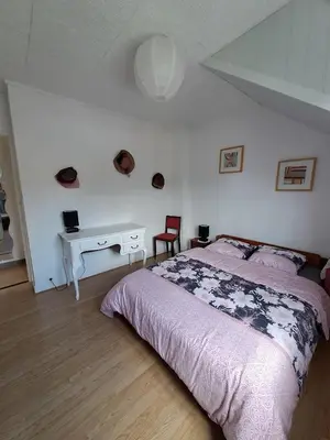 Un ou plusieurs lits dans un hébergement de l'établissement Charmante maison dans le centre historique de Morlaix