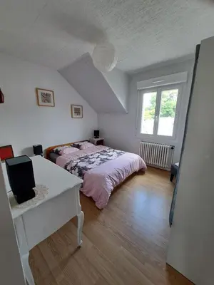 Un ou plusieurs lits dans un hébergement de l'établissement Charmante maison dans le centre historique de Morlaix