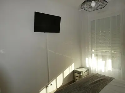 Télévision ou salle de divertissement dans l'établissement Ty Levenez