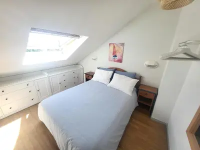 Un ou plusieurs lits dans un hébergement de l'établissement Appartement dans une résidence avec piscines