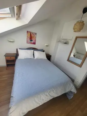 Un ou plusieurs lits dans un hébergement de l'établissement Appartement dans une résidence avec piscines