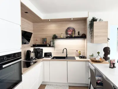 Cuisine ou kitchenette dans l'établissement Appartement de charme, Bénodet