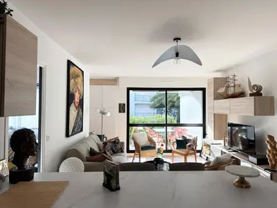 Télévision ou salle de divertissement dans l'établissement Appartement de charme, Bénodet