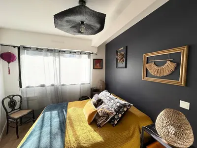 Un ou plusieurs lits dans un hébergement de l'établissement Appartement de charme, Bénodet