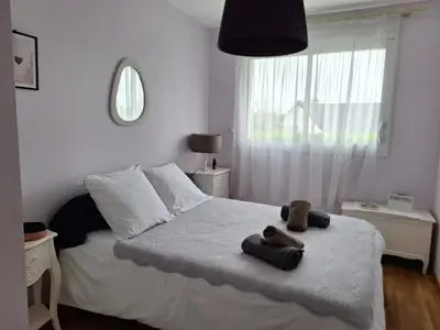 Un ou plusieurs lits dans un hébergement de l'établissement La Maison des Agapanthes - accès PMR - à 20 mn des Plages