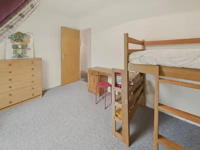 Un ou plusieurs lits dans un hébergement de l'établissement Maison avec jardin pour 8 adultes et 2 enfants