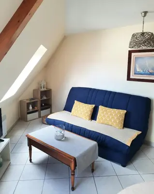 Coin salon dans l'établissement Trez-Hir Appartement 4 pers bord de mer
