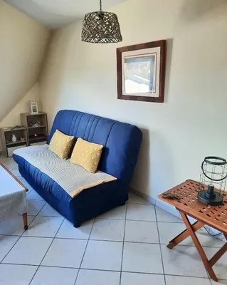 Coin salon dans l'établissement Trez-Hir Appartement 4 pers bord de mer