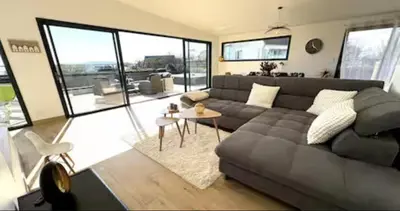 Coin salon dans l'établissement Villa Armor Vue mer et Spa