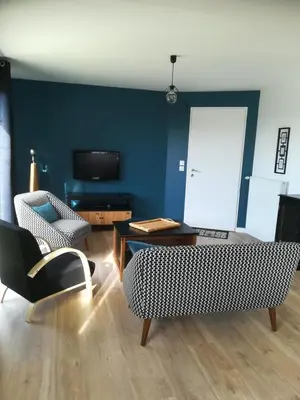 Télévision ou salle de divertissement dans l'établissement Meublé 3 étoiles Les Capucines