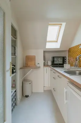 Cuisine ou kitchenette dans l'établissement Résidence du Steir - T2