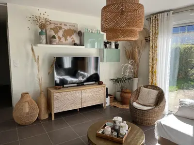 Télévision ou salle de divertissement dans l'établissement Maison bonheur