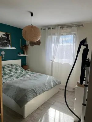 Un ou plusieurs lits dans un hébergement de l'établissement Maison bonheur