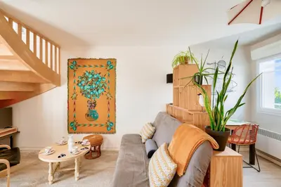 Coin salon dans l'établissement Duplex pour 4 proche du port - 500m de la plage