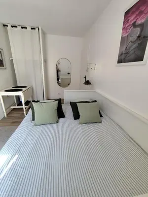 Un ou plusieurs lits dans un hébergement de l'établissement Studio Brest quartier St Michel