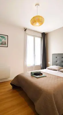 Un ou plusieurs lits dans un hébergement de l'établissement Petit cosy