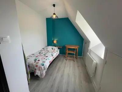 Un ou plusieurs lits dans un hébergement de l'établissement Le logis de Keramporchet - Proche plages
