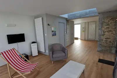 Télévision ou salle de divertissement dans l'établissement Rue Bara