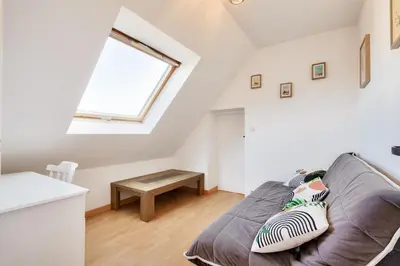 Un ou plusieurs lits dans un hébergement de l'établissement Maison pour 6 avec jardin à 500 m de la plage