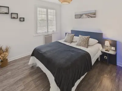 Un ou plusieurs lits dans un hébergement de l'établissement Appartement pour 4 à 5 minutes de la plage