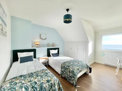 Un ou plusieurs lits dans un hébergement de l'établissement Villa Breizh - Front de mer - Accès plage - 8 personnes