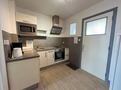 Cuisine ou kitchenette dans l'établissement Studio spacieux, proche mer et thalasso, parking privé