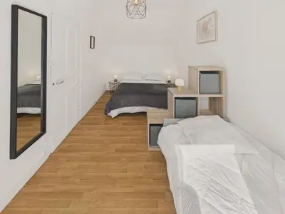 Un ou plusieurs lits dans un hébergement de l'établissement Maison pour 6 proche du port et de la plage