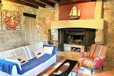 Coin salon dans l'établissement Manoir du Scluz-Prestigieux domaine vue mer