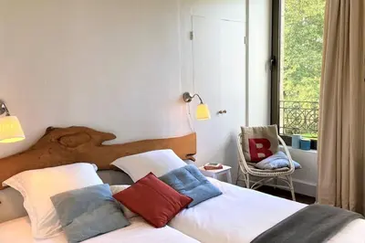 Un ou plusieurs lits dans un hébergement de l'établissement Manoir du Scluz-Prestigieux domaine vue mer